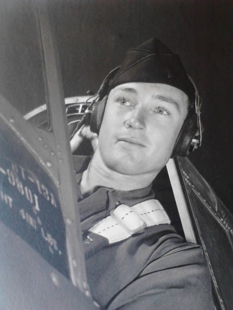 Young George B Davis in an airplane